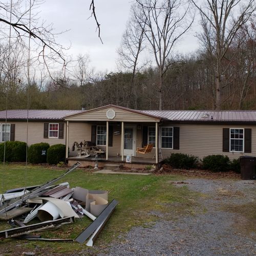 metal roof and 6 inch gutters and downspouts 