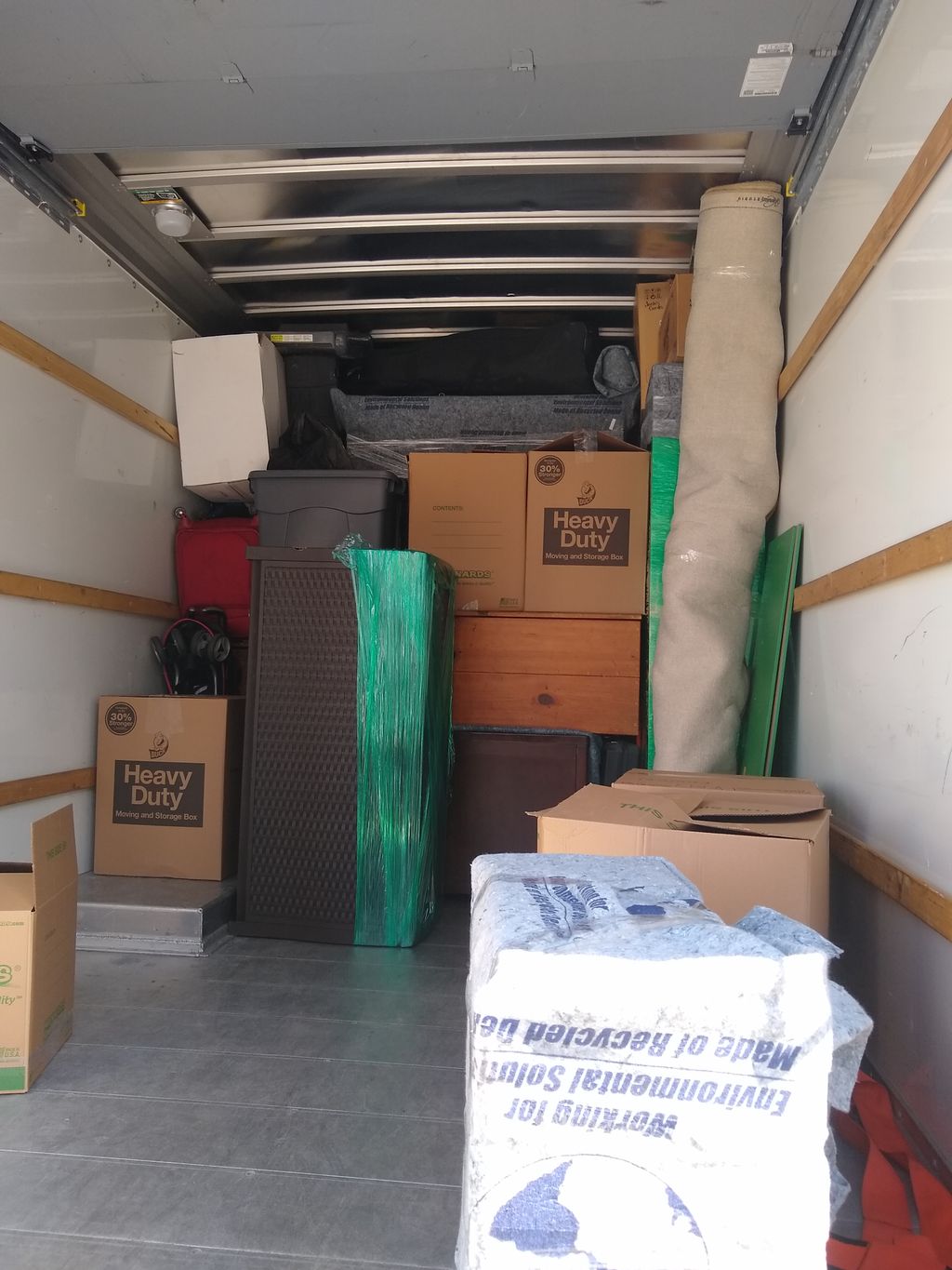A neatly and tightly packed truck. 