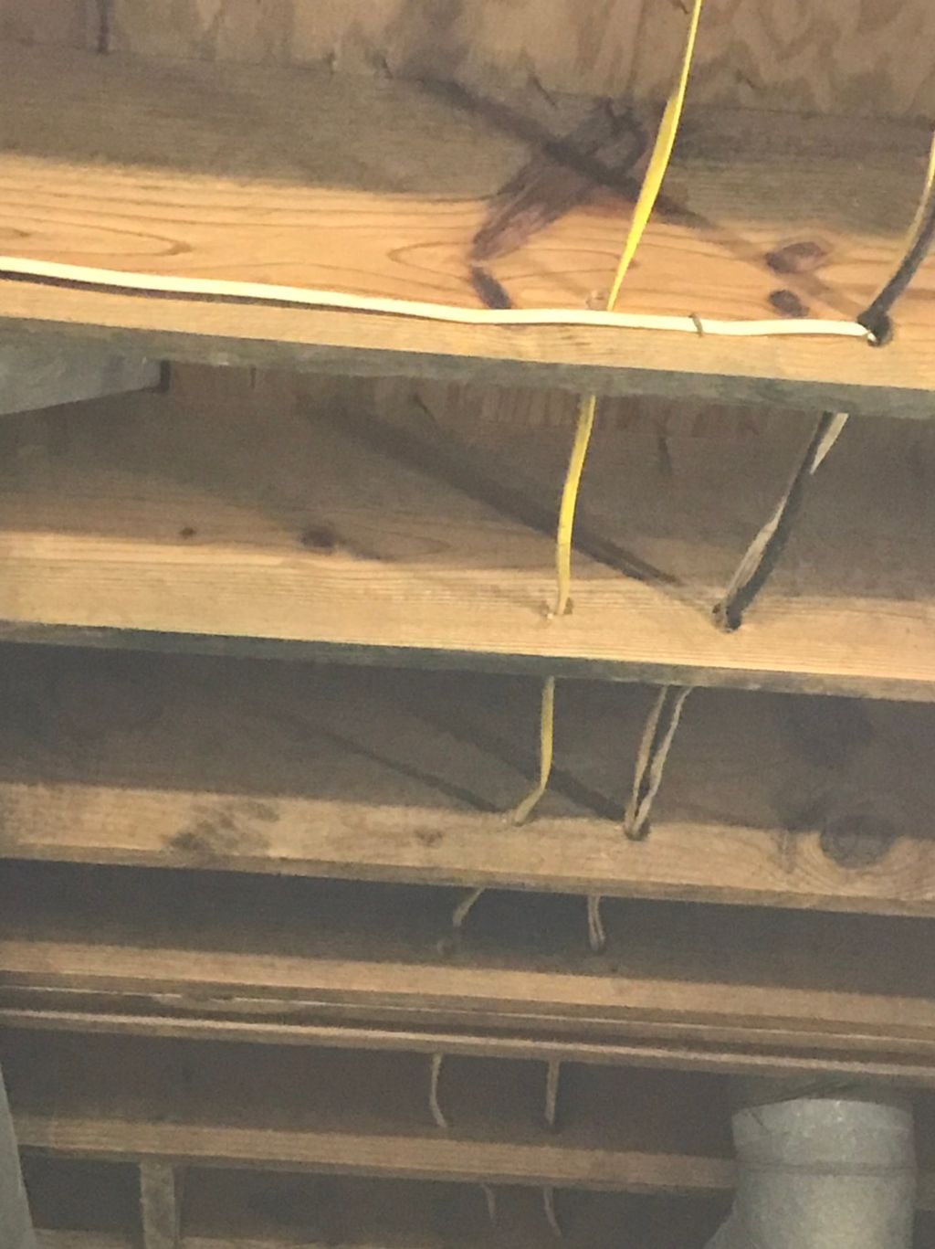 After pic floor joist cleaning in basement 