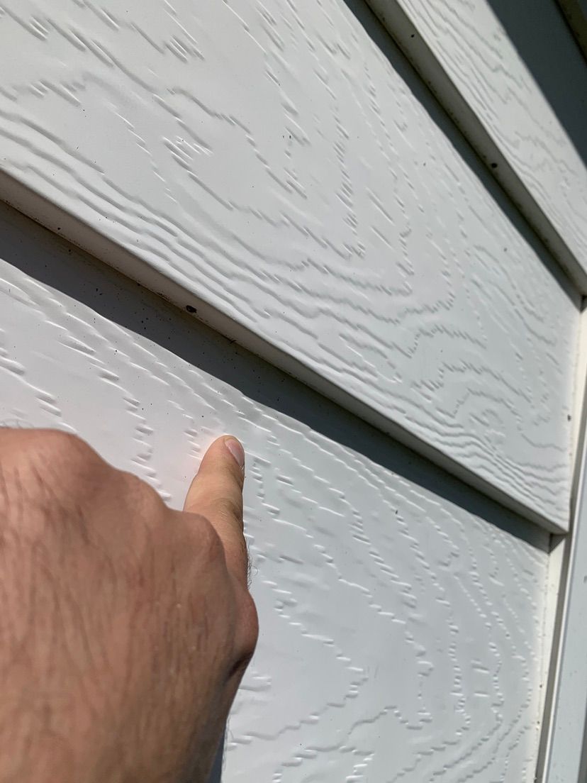 Hail damage to metal siding
