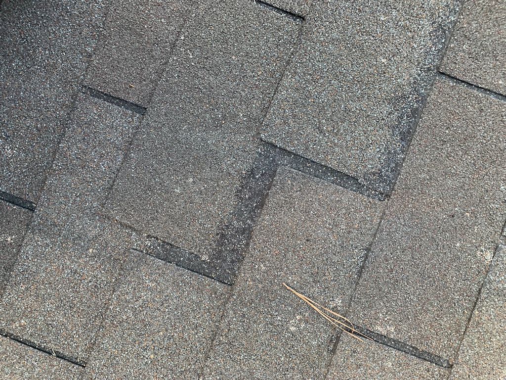 Wind damage to shingles 