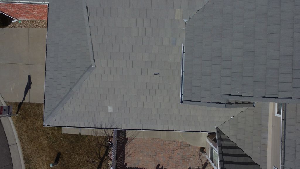 Drone inspection of a tile roof, a tile is broken