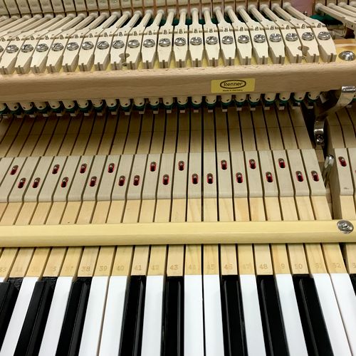 Restored grand piano action with German Renner par