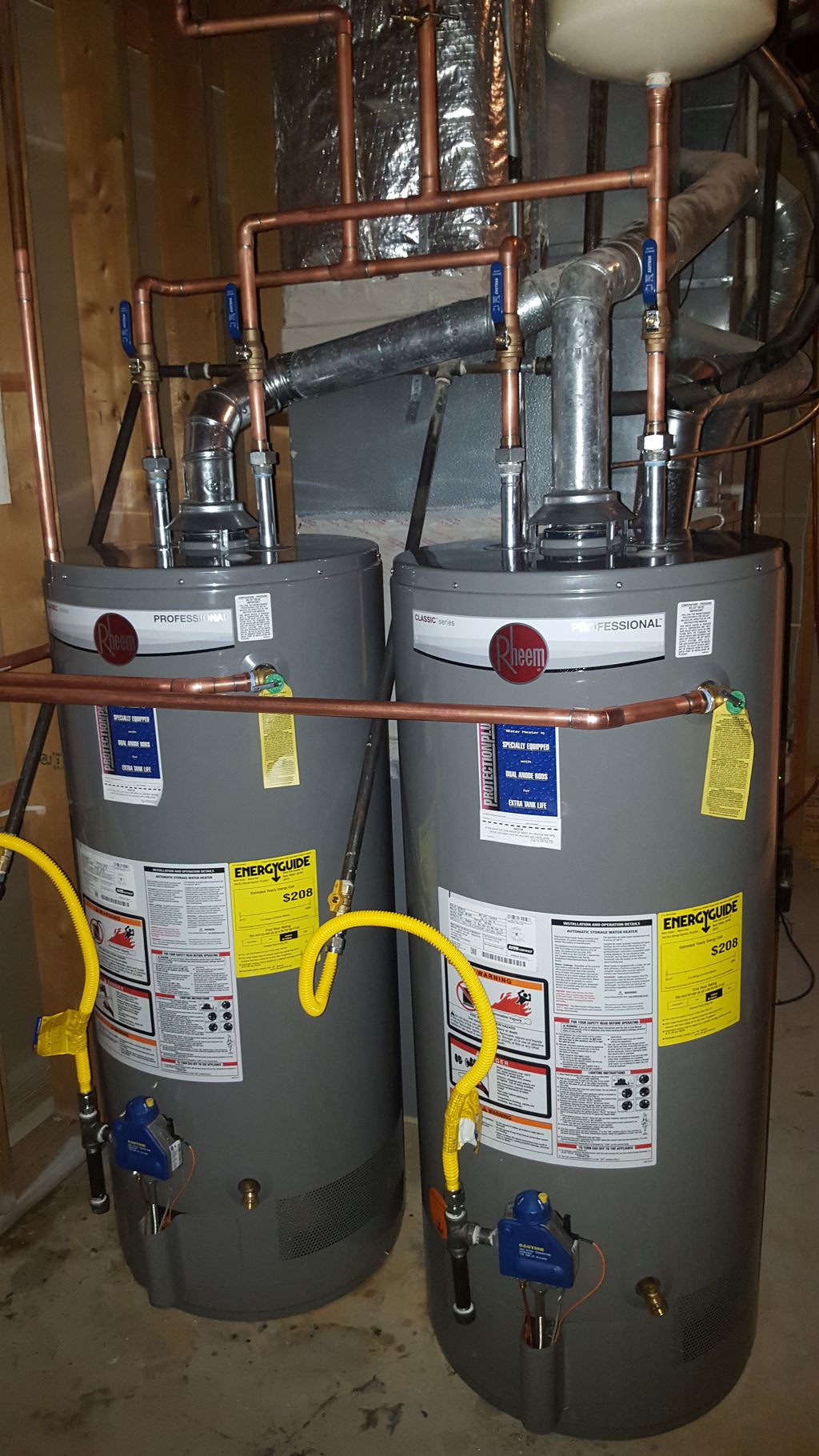 2 Rheem 40 gallon gas short water heaters installe