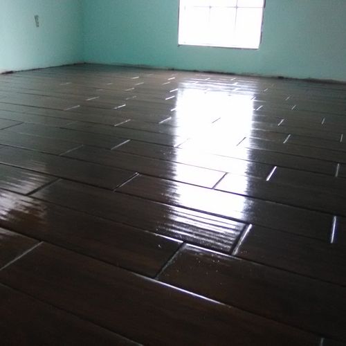 Ceramic tile plank flooring installed