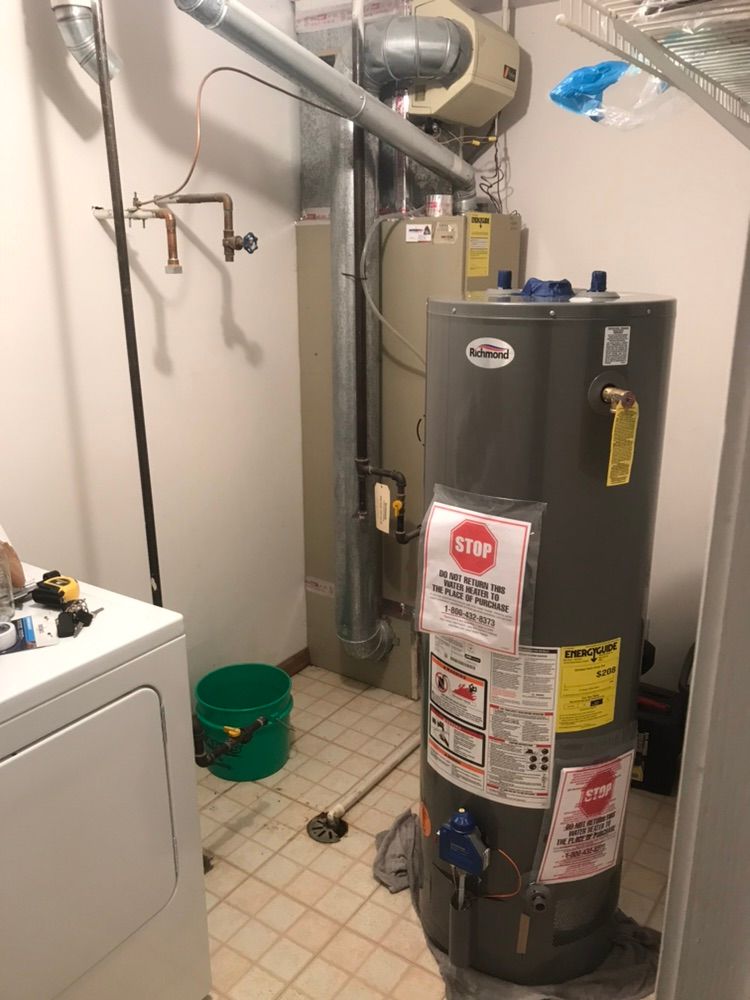 Installing new water heater.
