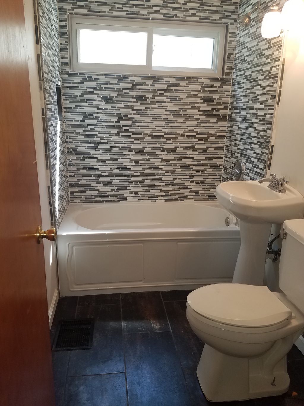 Full bathroom remodel with mosaic tiles for the sh