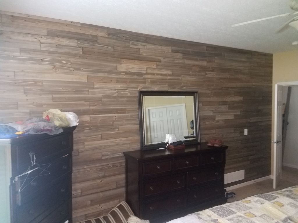 Pallet style wood makes a good accent for any room