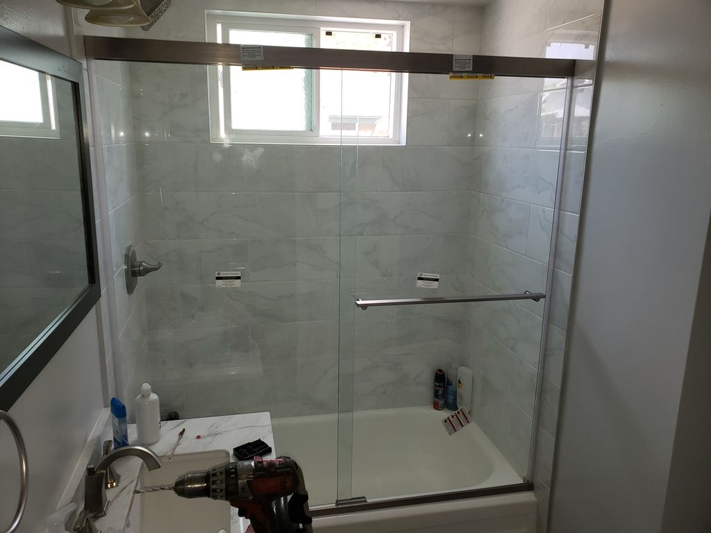 bathtub glass door install