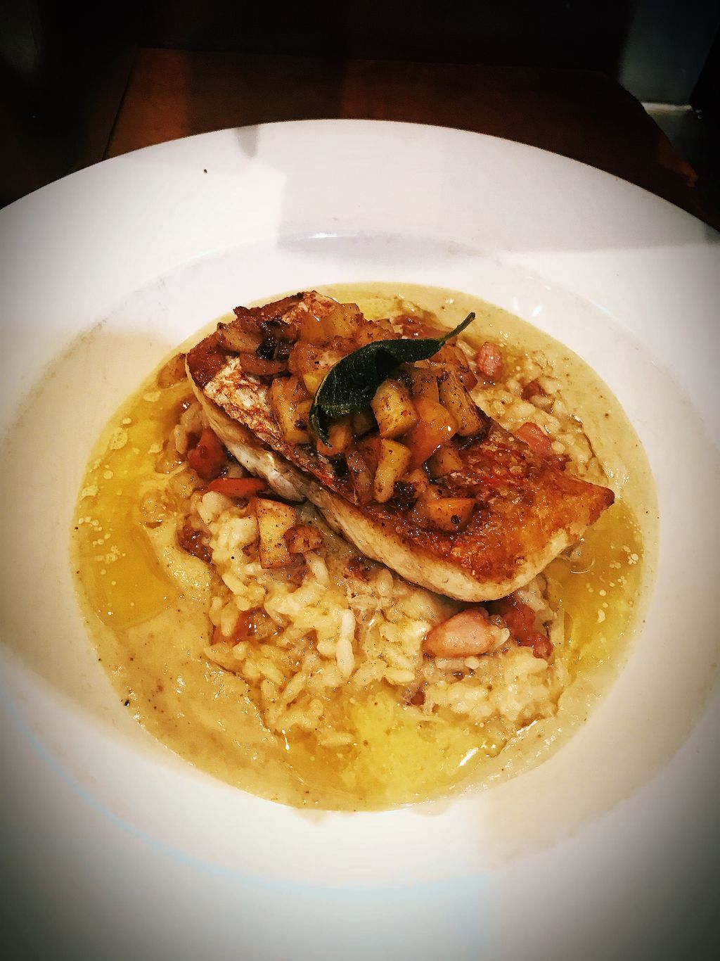 an Seared Red snapper, over a pancetta risotto, to