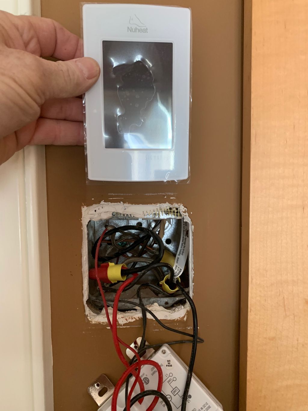 Installation of high voltage floor heating control