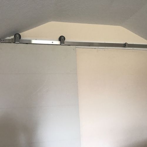 Eric installed a barn door in a tricky location in