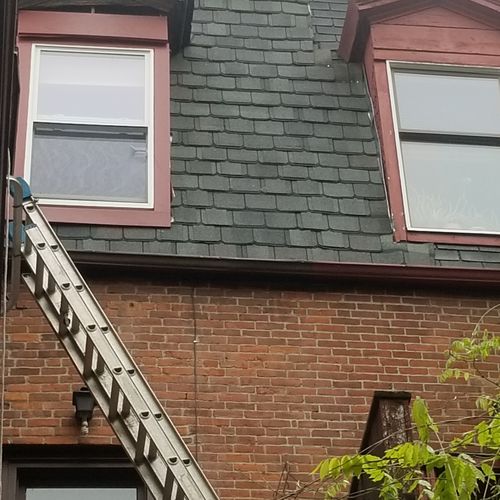 Mansard roof replacement and window restoration wo