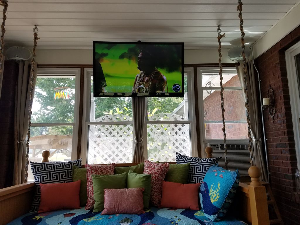 TV suspended using ceiling mount