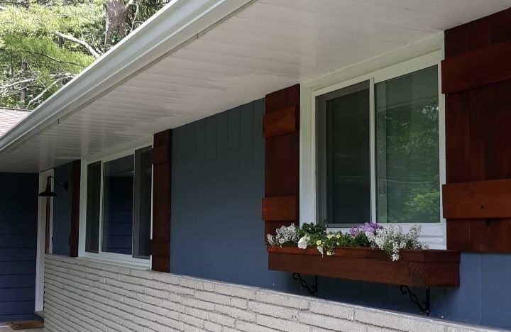 Second window box and two sets of shutters on fron