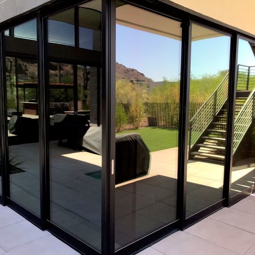 Custom 90 degree multi-slide patio door in Paradis