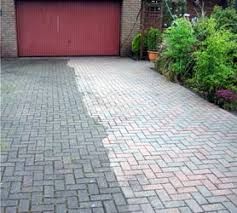 Brick Driveway before and After Pressure Washed!