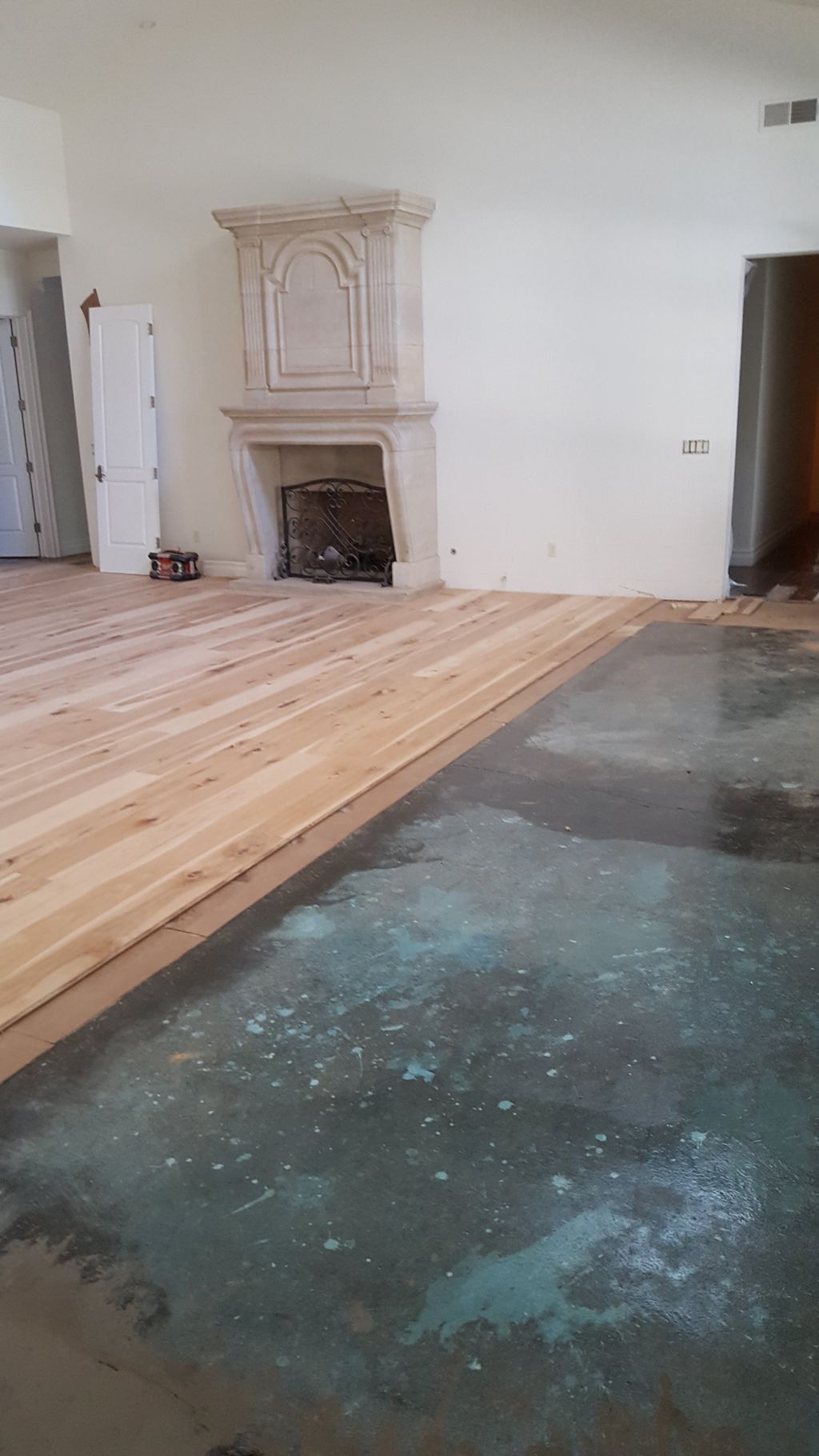 Sub-floor Complete and New Hickory Flooring Being 