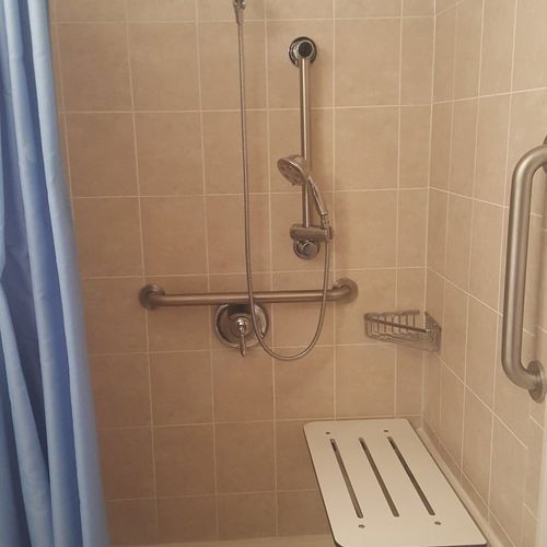 Shower alteration for handicap: plumbing for water
