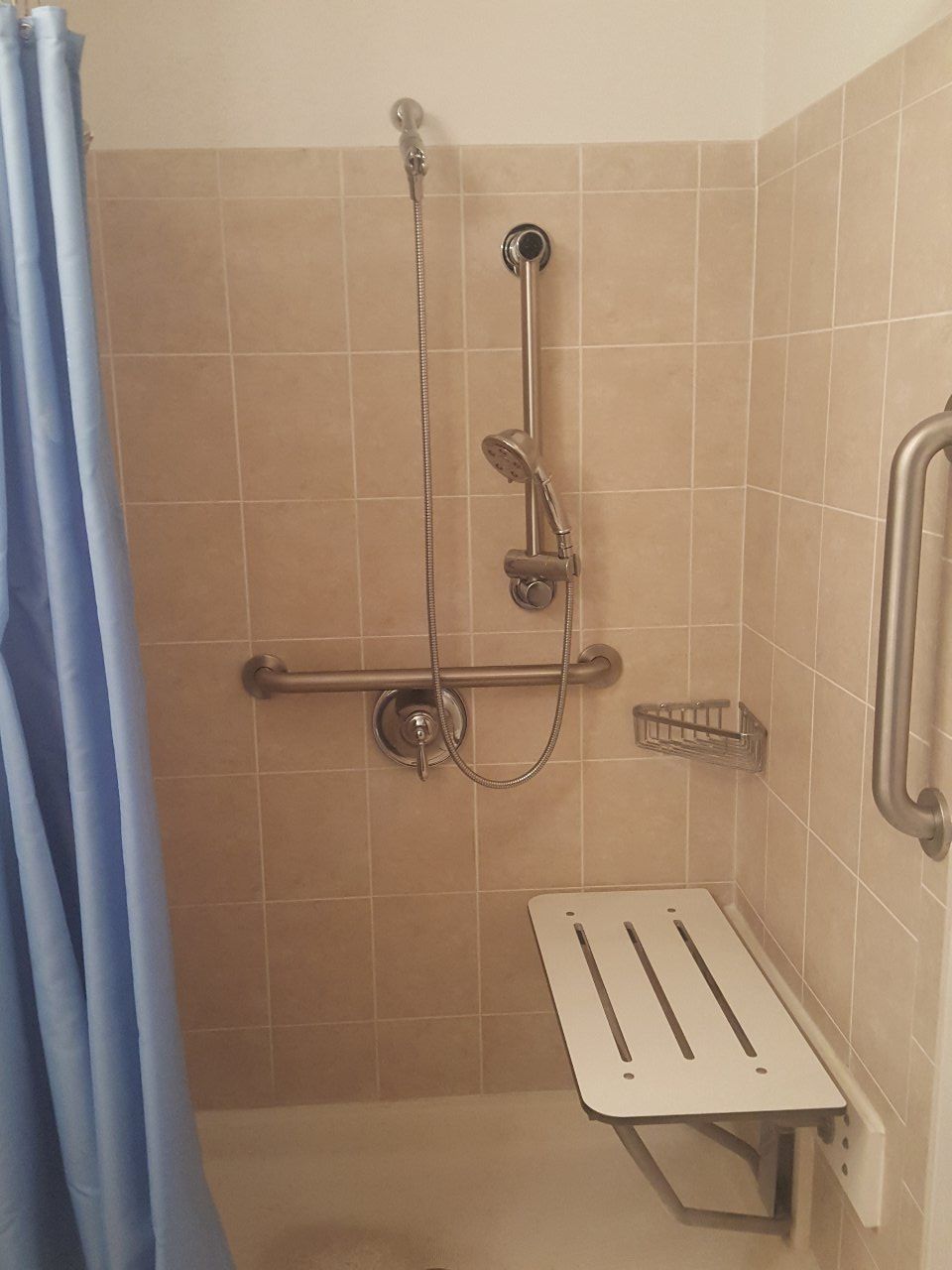 Shower alteration for handicap: plumbing for water