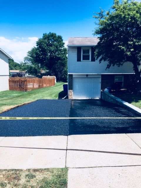 Add on and sealcoating older driveway