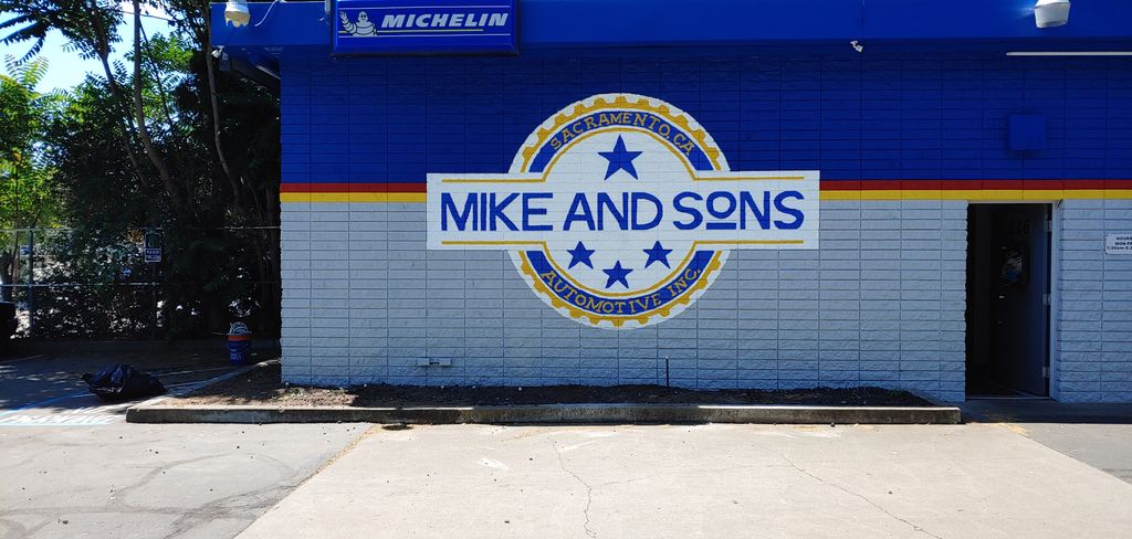 Logo painted on rough concrete brick