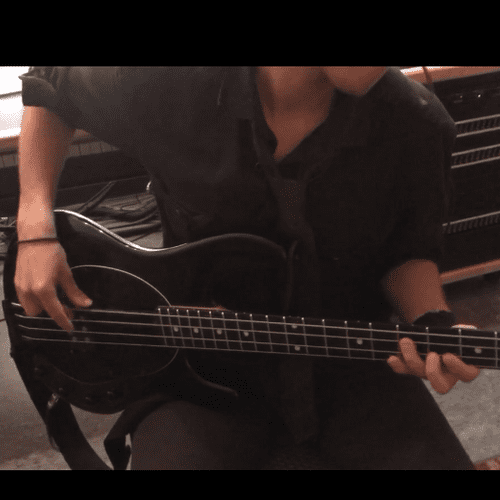 Recording the bass parts for one of my band's song