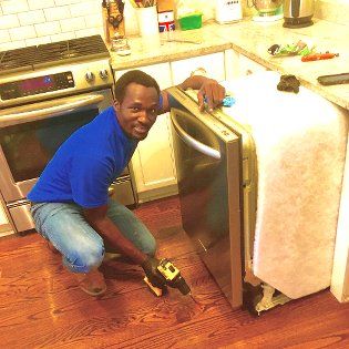 John moving a dishwasher to seal the entry point b