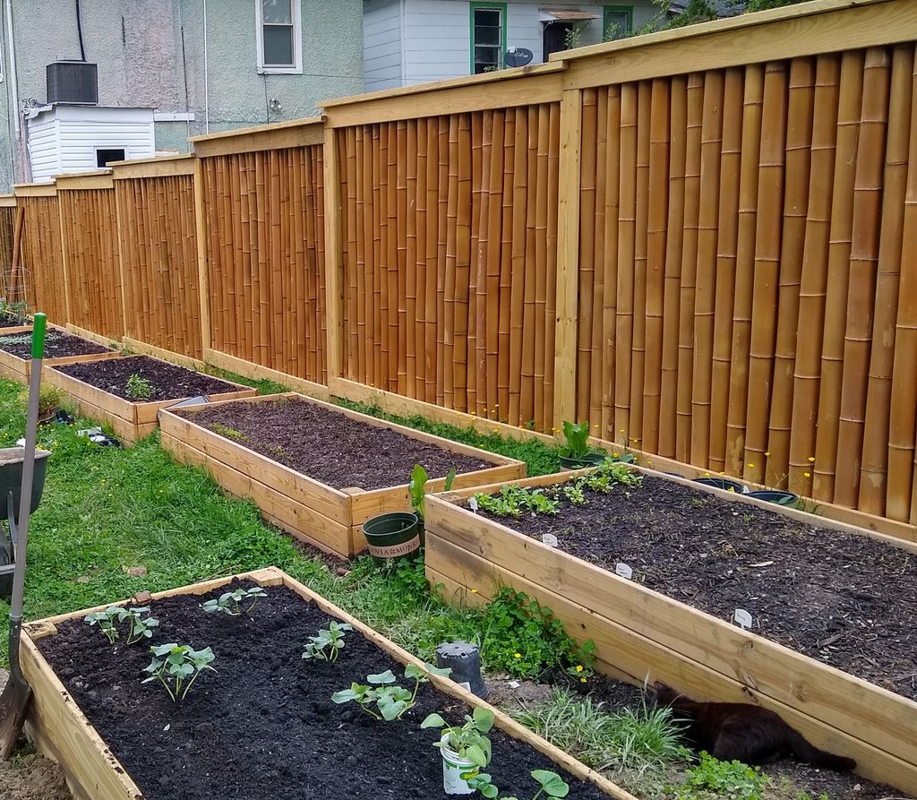 Custom Bamboo Privacy Fence with Terraced Raised V