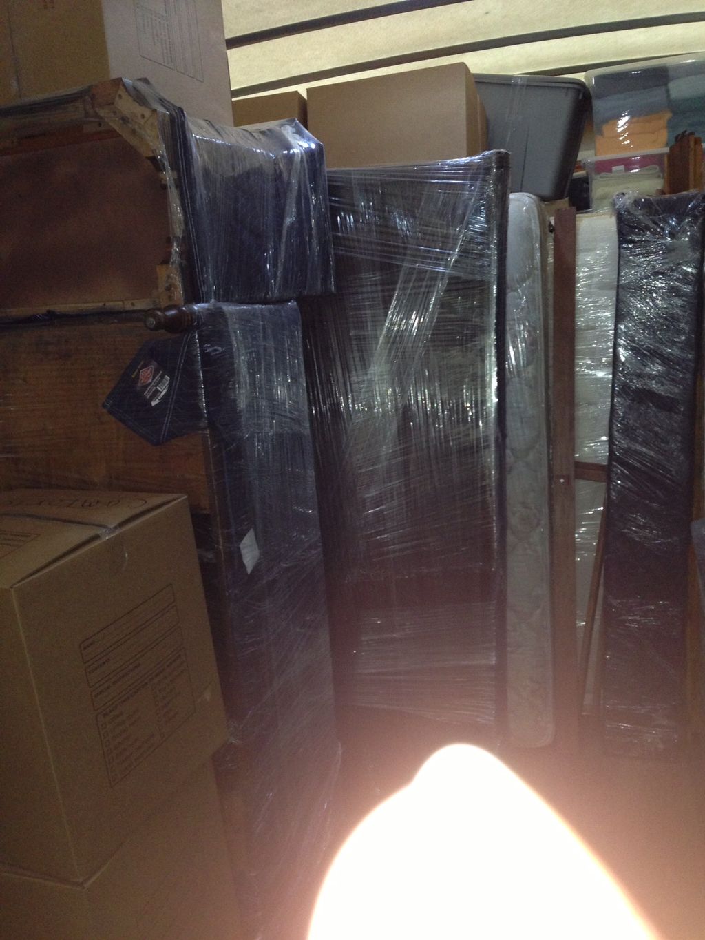 Furniture wrapped and protected. 