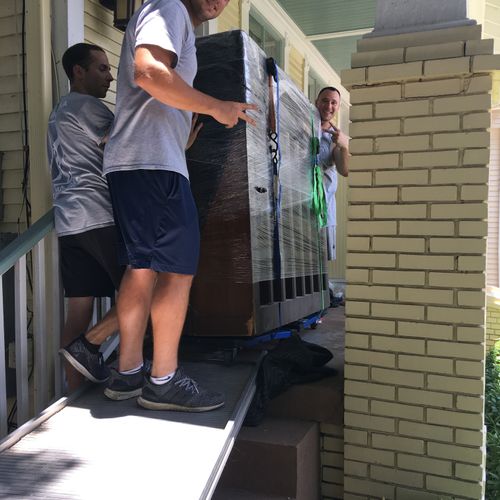 Moving an upright piano into a customer's home
