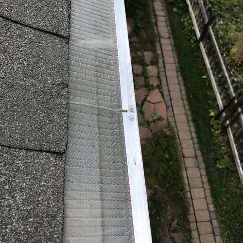 Cleaned gutters with gutter guards
