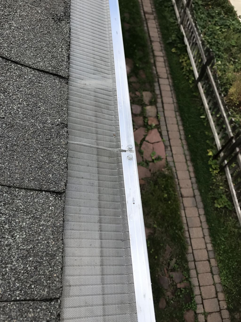 Cleaned gutters with gutter guards