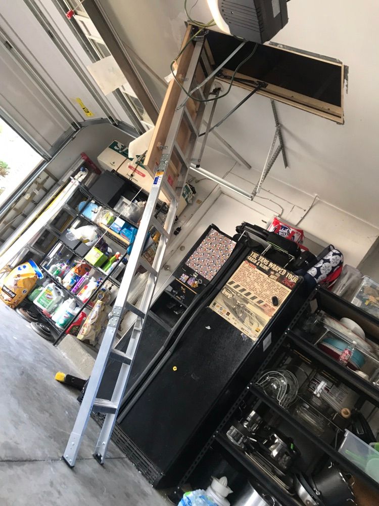 installing ladder to attic above garage for our cl