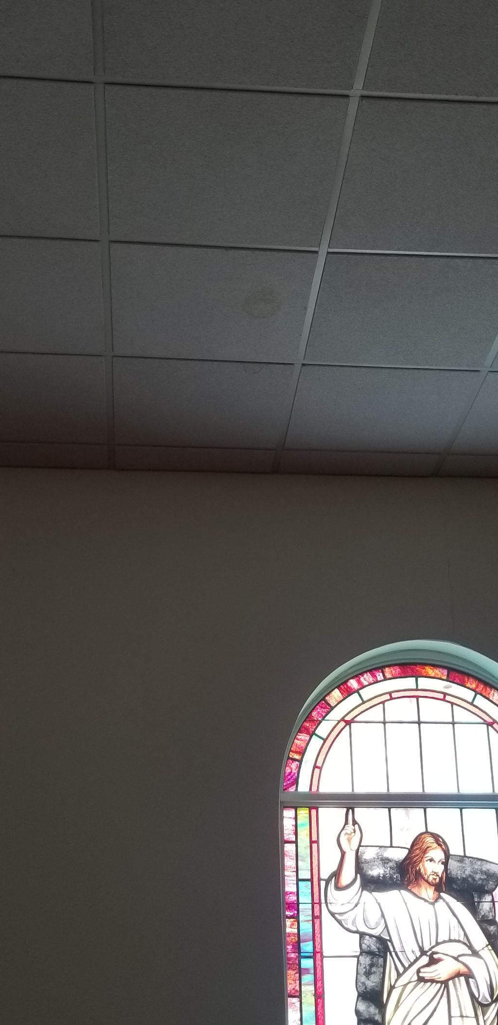Water damaged dropped ceiling tiles replaced in Ce