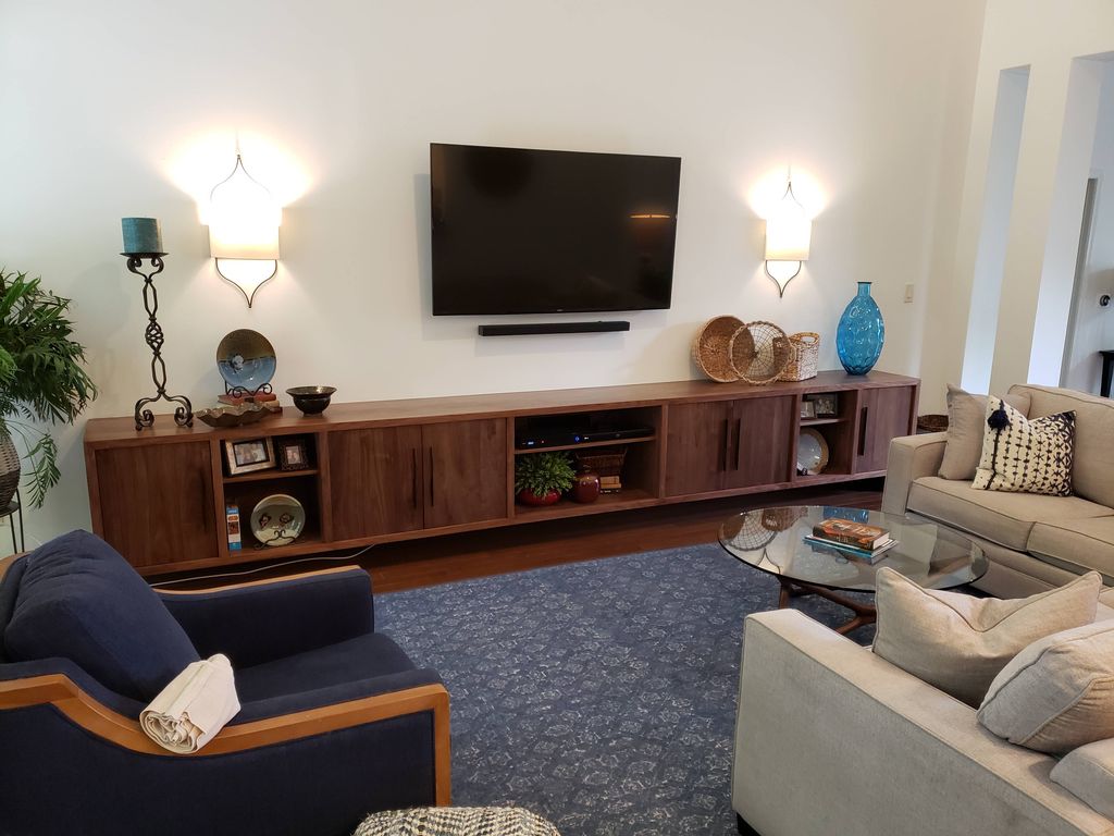 Custom 15' long walnut media console, built and in