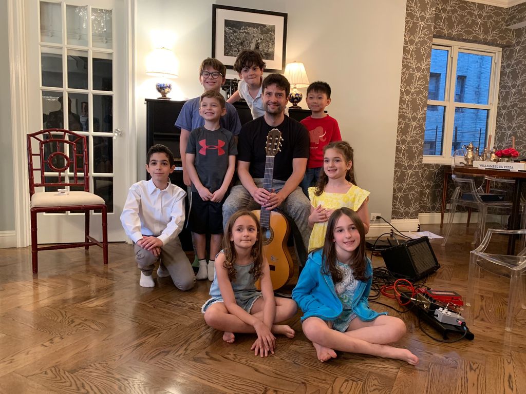 Young piano and guitar students at kids' recital!