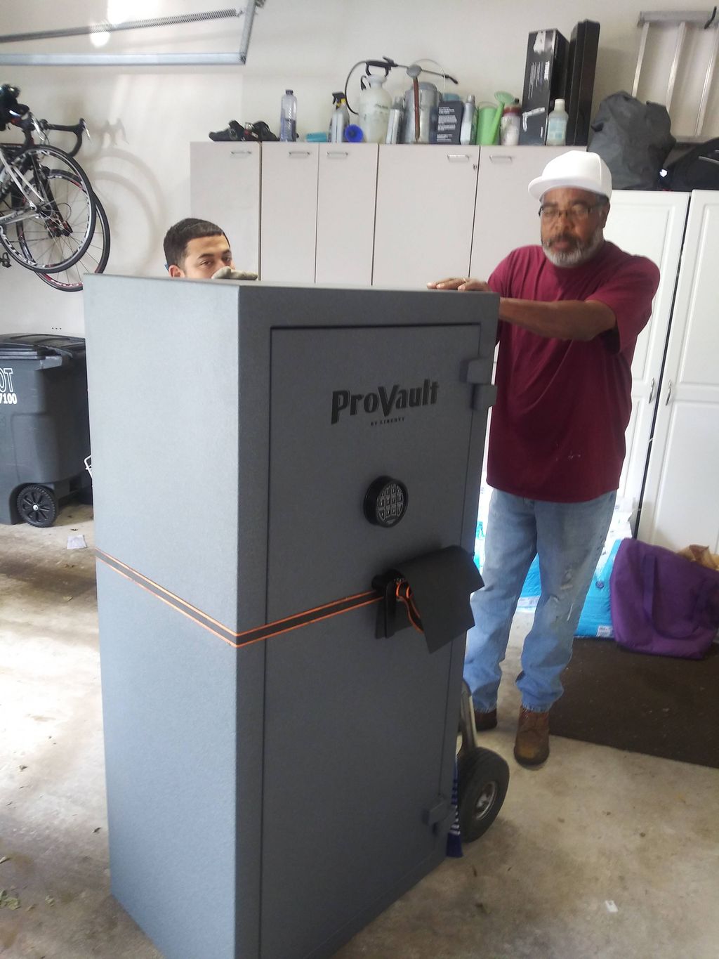 Preparing to move a gun safe.