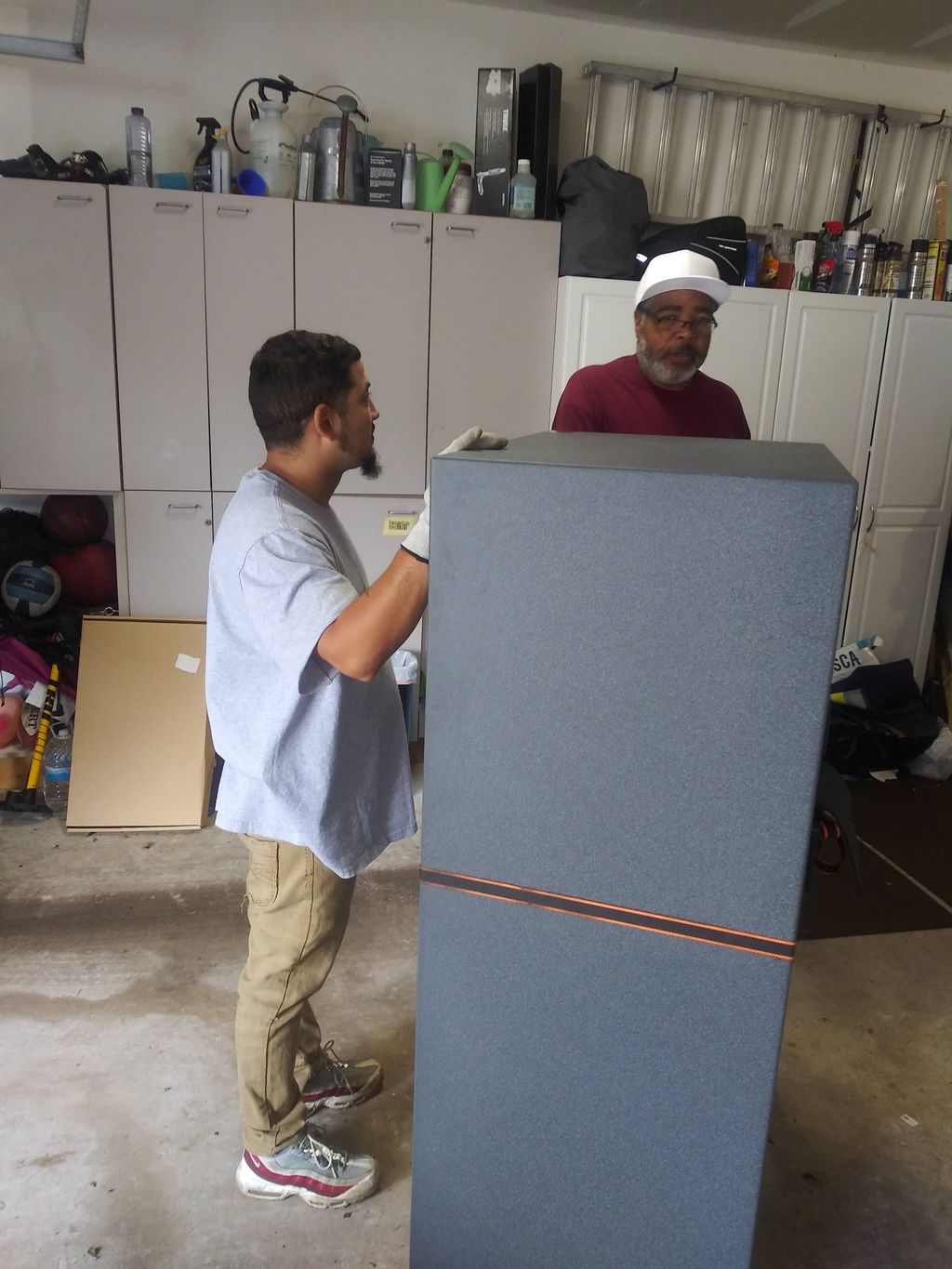 Preparing to move a gun safe.