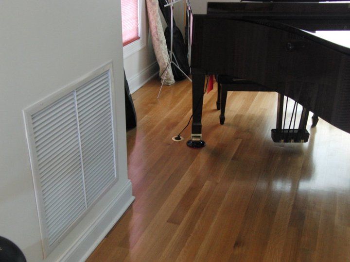 Floor outlet for player piano