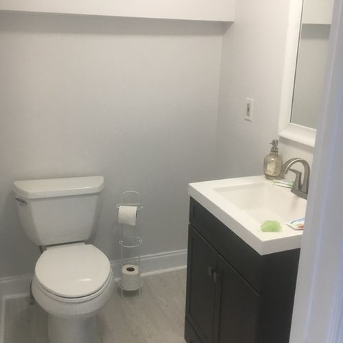 Small bathroom remodel, new flooring, baseboard, t