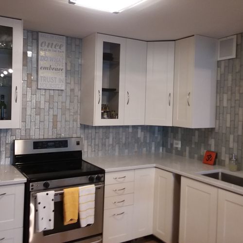 Clean countertops, cabinets and appliances after a