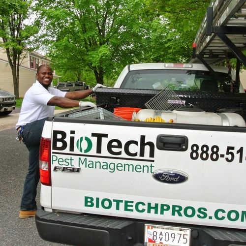 Clifford climbing onto the BioTech company truck t