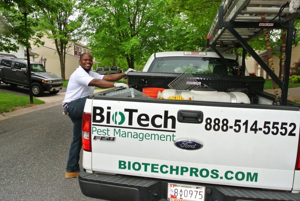 Clifford climbing onto the BioTech company truck t
