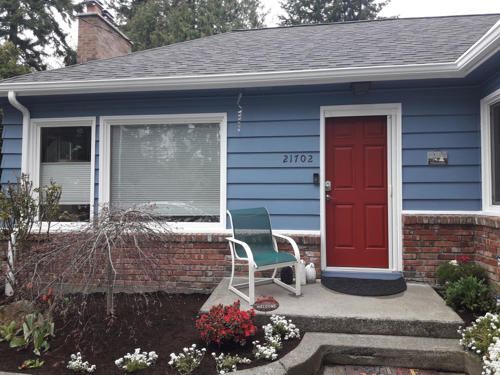 after (red door, white window and door  trim)