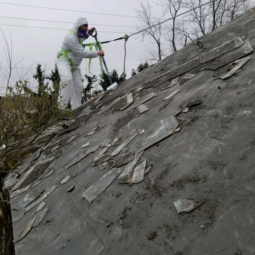 Asbestos roofing shingles removal 