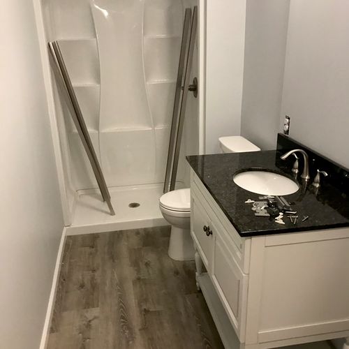Shower sink and toilet installed