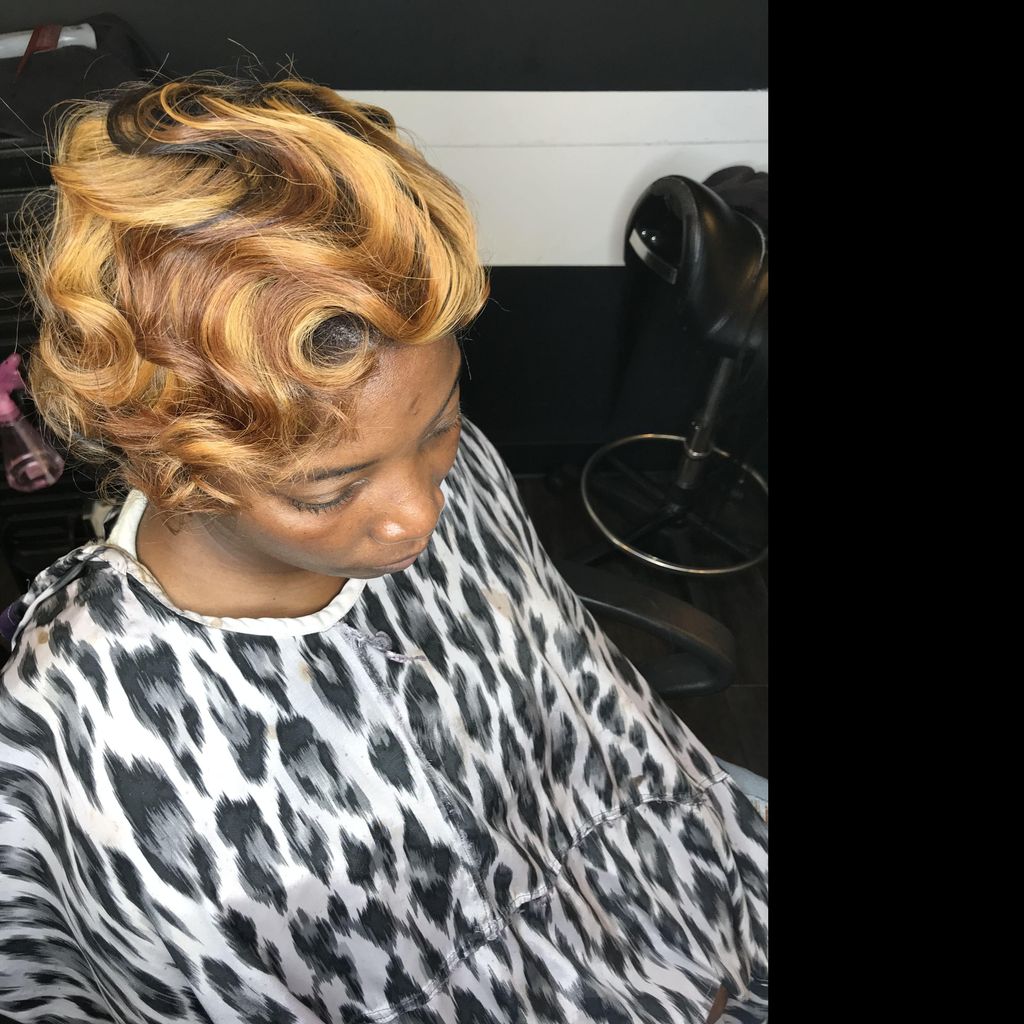 A Touch Of Te' Hair Studio