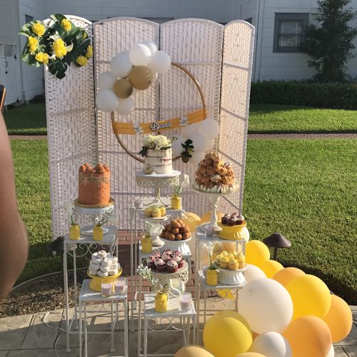 cake setup fo a baby shower pool party