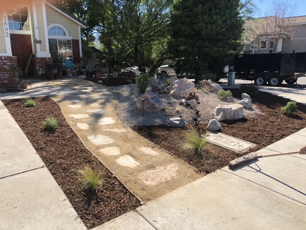 Front yard relandscape 
Builders installation 